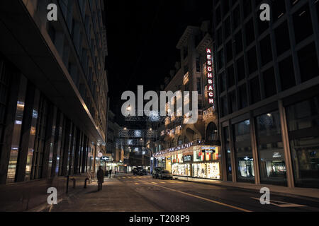 Geneva, Switzerland - November 24, 2016: Rue du Rhone. Night cityscape of Geneva city Stock Photo