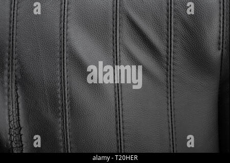 Black torn leather texture with stripes, surface background Stock Photo