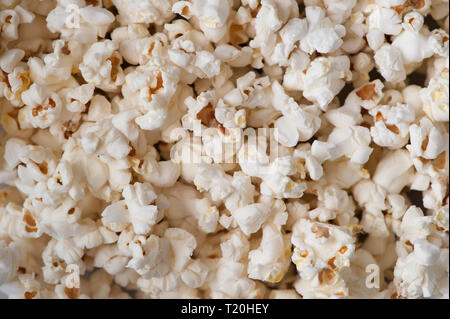 Scattered simple popcorn, texture background Stock Photo