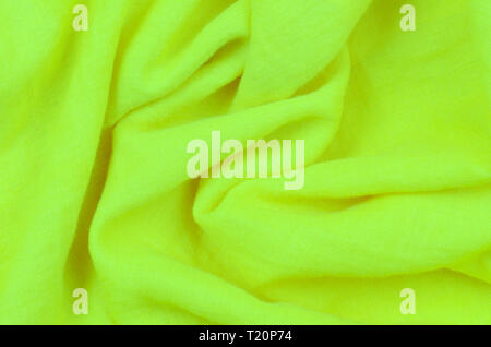 close up crumpled green cotton fabric background Stock Photo