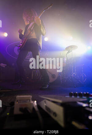 Killers Guitarist, Dave Keuning performing in Glasgow to a packed crowd at the renowned King Tuts Wah Wah Hut in Glasgow. Stock Photo