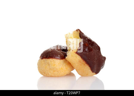 chocolate eclairs with a bite taken out Stock Photo