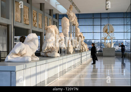 The Parthenon and Acropolis seen through the windows of the new Acropolis Museum,  designed by architect Bernard Tschumi,  Athens, Greece Stock Photo