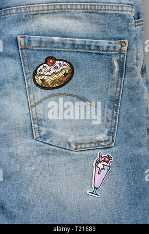 Close up on patched jeans Stock Photo