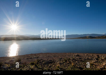 Morocco, Lalla Takerkoust, reservoir against the sun Stock Photo