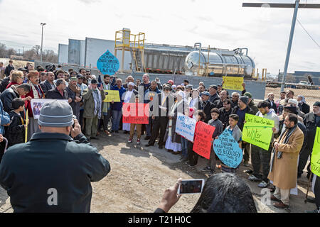 Detroit, Michigan, USA. 29th Mar, 2019. After Friday prayers at the Masjid (mosque) Muath Bin Jabel, people marched to the nearby US Ecology plant to oppose a proposed expansion of the hazardous waste facility. The plant is near a low-income, mostly immigrant neighborhood. Credit: Jim West/Alamy Live News Stock Photo