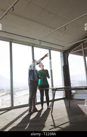 Architects discussing over digital tablet in the office Stock Photo