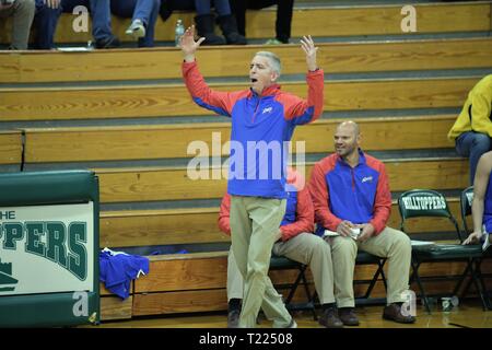 Coach reacting to a call made on the court that did not go his team's way. USA. Stock Photo