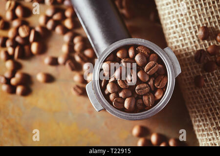 Espresso coffee machine handle with coffee beans Stock Photo