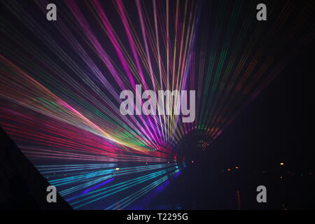 Laser beams during a public show in several colors at the water of the Ringvaart (Ring canal) Zuidplaspolder in Nieuwerkerk aan den IJssel Stock Photo