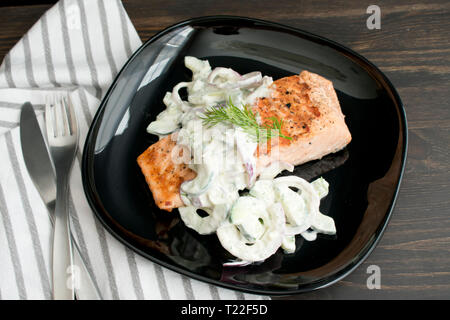 Grilled Salmon with Cucumber-Dill Salad Stock Photo