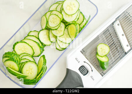 English Cucumber Sliced with a Mandoline Stock Photo