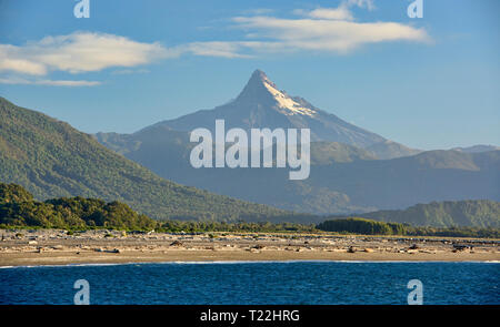 View of Corcovado Volcano across the bay from Chaiten, Patagonia, Region de los Lagos, Chile Stock Photo