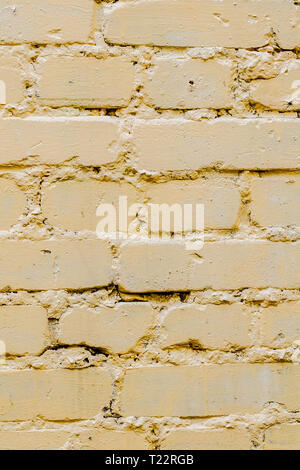 Yellow bricks pattern on wall for abstract background. Stock Photo