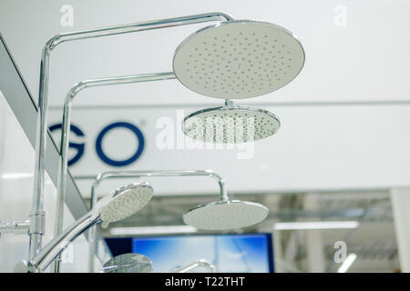 Mixers taps for shower in a hardware store. Stock Photo