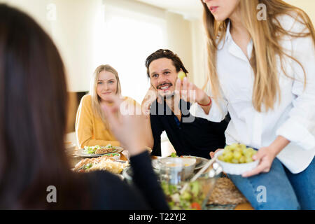 Friends having lunch together Stock Photo