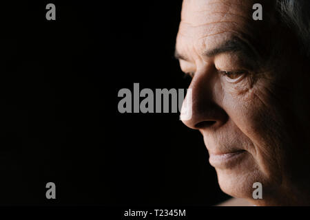 Close-up of serious senior man Stock Photo