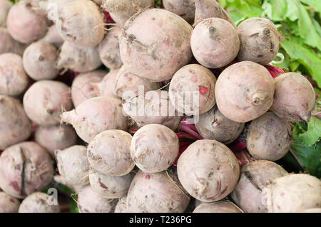 Fresh beetroots on a market stall. Selective focus. Stock Photo