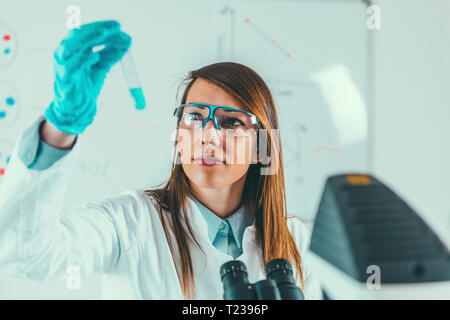 Biotechnology. Female scientist working in laboratory. Stock Photo