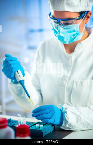Biotechnology. Female scientist working in laboratory. Stock Photo