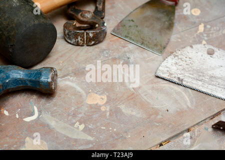 DIY work tools, used tools on a work bench Stock Photo