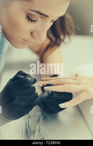 Woman having manicure. Stock Photo