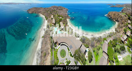 PAPAGAYO, COSTA RICA -18 MAR 2019- Aerial view of the Four Seasons Resort Costa Rica and the Peninsula Papagayo during the dry season in Guanacaste. Stock Photo