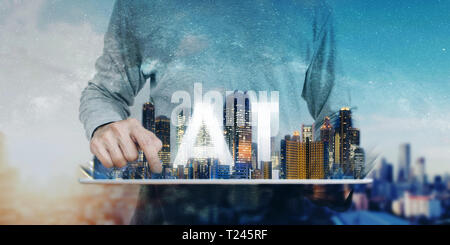 Artificial Intelligence technology, a man using digital tablet, with modern buildings hologram and A.I. Stock Photo