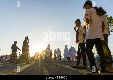 People go to harbour to do sholat in the morning at Eid Mubarak Day Stock Photo