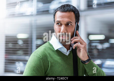 Businessman using smartphone Stock Photo