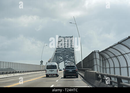 road traffic on the bridge of the americas entrance to the panama canal in the west of panama city panama Stock Photo