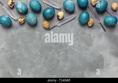 Easter composition on gray textured background with space for text. Gray background - concrete structure Stock Photo