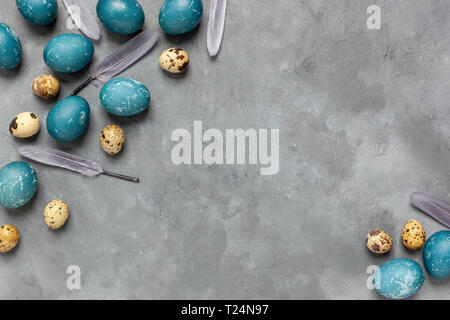 Easter composition on gray textured background with space for text. Gray background - concrete structure Stock Photo