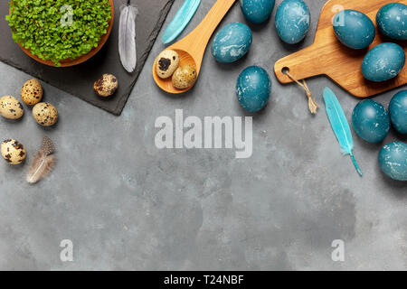 Easter composition on gray textured background with space for text. Gray background - concrete structure Stock Photo