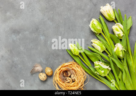 Easter composition on gray textured background with space for text. Gray background - concrete structure Stock Photo