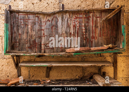 Tool outlines painted on a wooden rack over a work station bench in an abandoned garage workshop in Los Bebederos, Malpais de la Rasca, Palm Mar, Tene Stock Photo