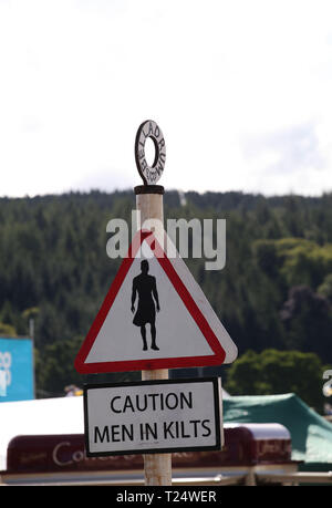 Caution Men In Kilts Sign Belladrum Tartan Hearts Festival Stock Photo