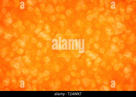 Spotted orange paper close up. Large macro background and texture Stock Photo
