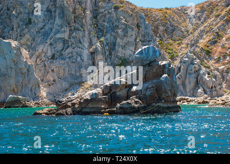 The distinctive Pelican Rock near the marina in Cabo San Lucas, Mexico Stock Photo