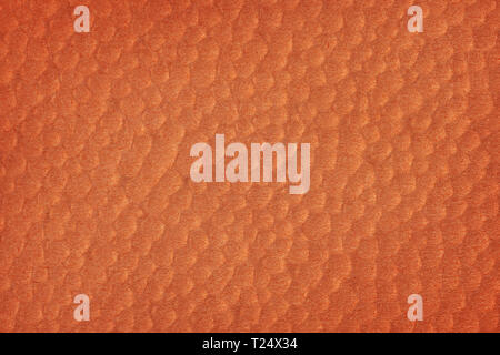 Abstract textured orange background. Bubbles on brick colored paper Stock Photo