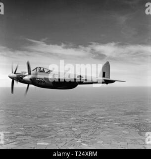 British Royal air Force De Havilland Mosquito Mk. XVIII, PZ467, in flight  over the UK, in 1945. This aircraft was delivered to the US Navy in 1945,  reregistered as , but was