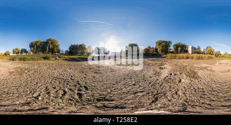 360 degree panoramic view of full seamless spherical panorama 360 degrees angle view at the bottom of dried up pond in garden of residential area in equirectangular projection, re