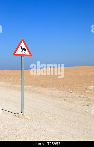 camel crossing sign in the desert Stock Photo