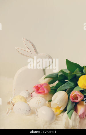 Toned background easter tulips and eggs Stock Photo - Alamy