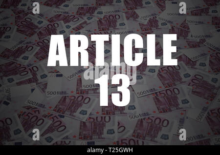 Article 13 inscription on many euro currency bills background. European copyright directive including article 13 is approved by european parliament Stock Photo