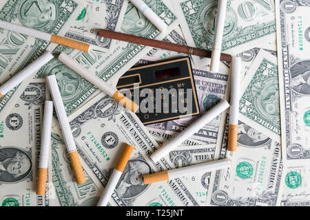 Rising prices for tobacco cigarettes, concept. High cigarette prices count smoking costs. Stock Photo