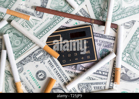 Rising prices for tobacco cigarettes concept. High cigarette prices count smoking costs. Stock Photo