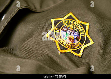 California Department of Corrections uniform patch; star logo on correctional officer uniform; correctional officers. Stock Photo