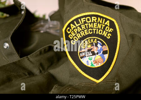 California Department of Corrections uniform patch; logo on correctional officer uniform; correctional officers. Stock Photo