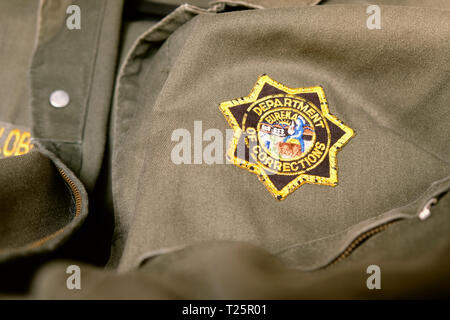 California Department of Corrections uniform patch; star logo on correctional officer uniform; correctional officers. Stock Photo